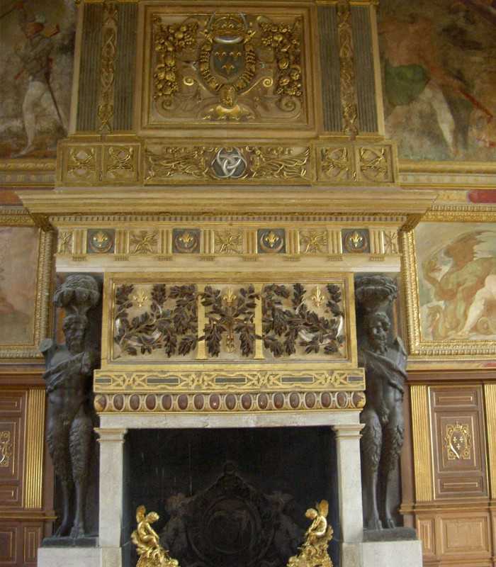 Ornate chimney detail at Fontainebleau Castle on a private trip from Paris