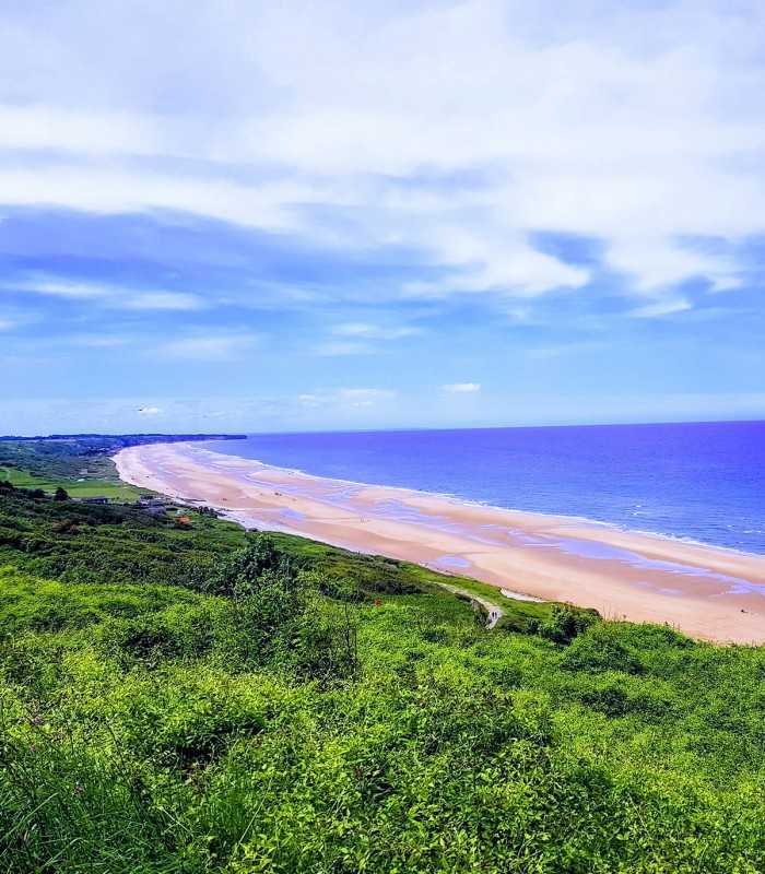 Scenic panoramic view of Omaha Beach during a guided D-Day private tour from Paris