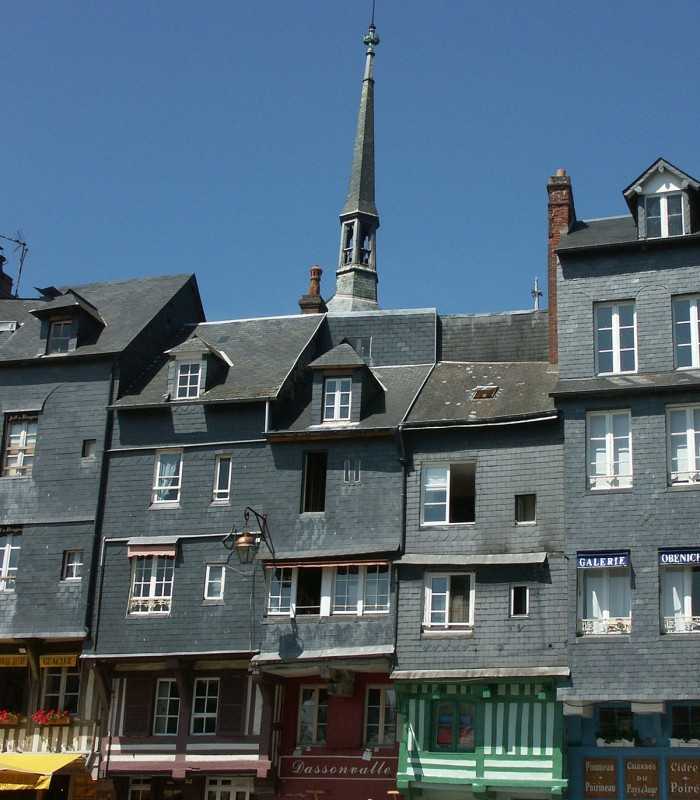 Honfleur’s slate-roof houses and Rouen Cathedral visited during a private day trip from Paris