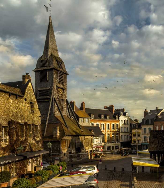 Private guided tour from Paris discovering Rouen Cathedral, famously painted by Monet, and Honfleur harbor.