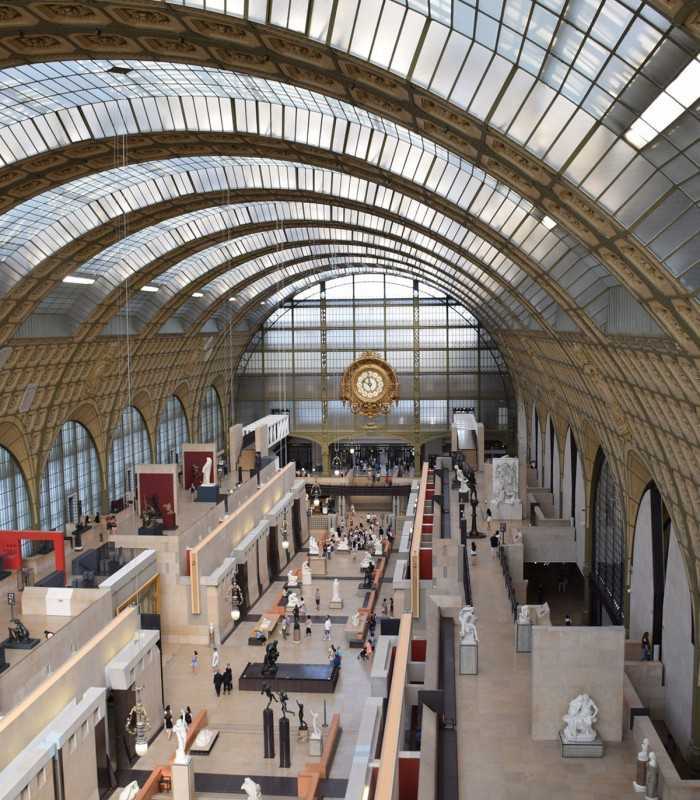 Inside Musée d’Orsay during a private guided visit, admiring masterpieces by Monet, Van Gogh, and more