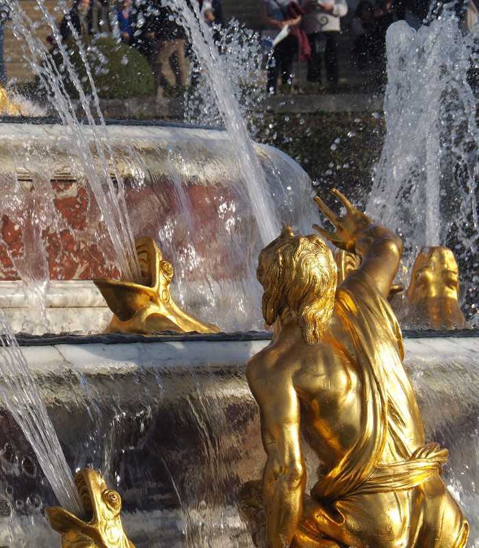 Sculptures of the Latona Fountain at Versailles featured on a private excursion from Paris